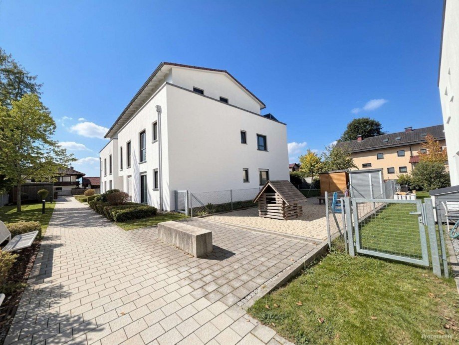 Au�enansicht - (KI generiert) Erdgeschosswohnung Taufkirchen